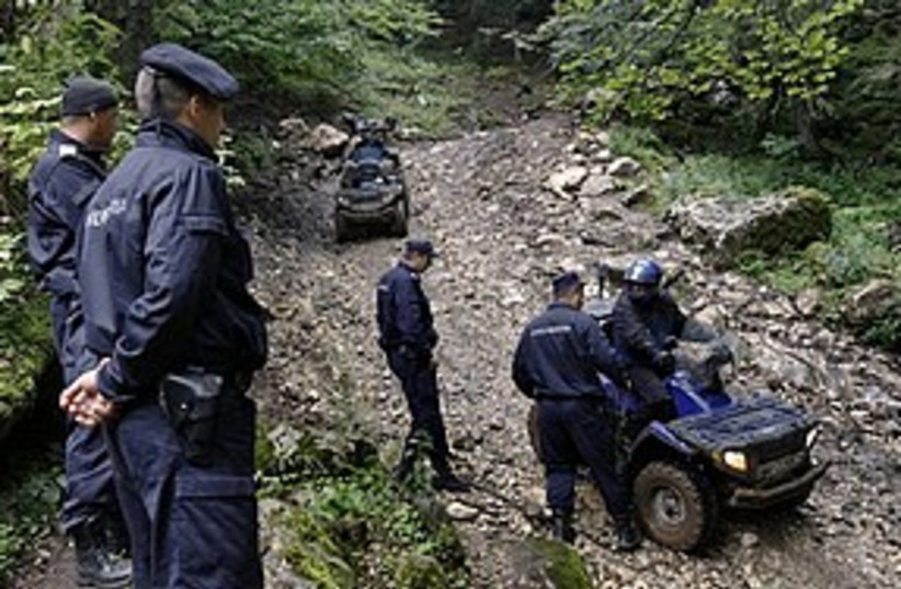 Romania crash search 311 AP (photo credit: Associated Press)