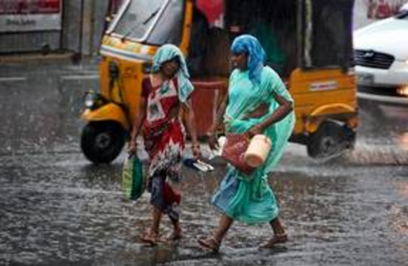 India Rains 311 (photo credit: Associated Press)