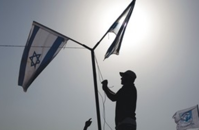Israeli Flags 311 (photo credit: ASSOCIATED PRESS)