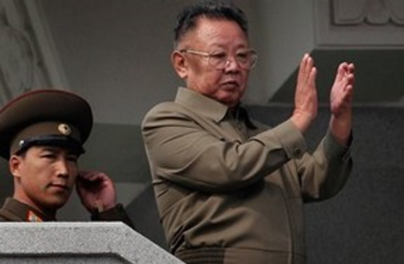 311_Kim Jong Il with son Un (photo credit: Associated Press)