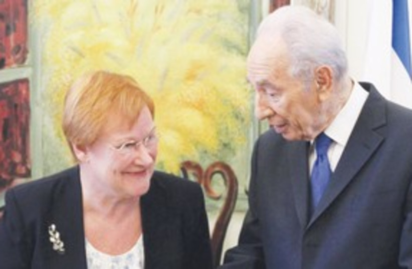 Peres with Finnish president 311 (photo credit: Associated Press)