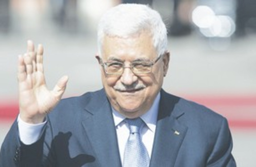311_Abbas winking (photo credit: Associated Press)
