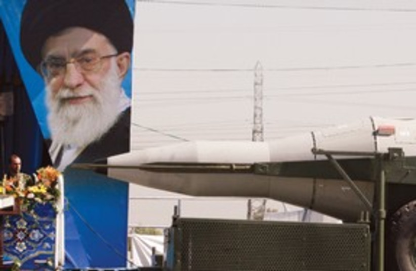 Ayatollah and Missile 311 (photo credit: ASSOCIATED PRESS)