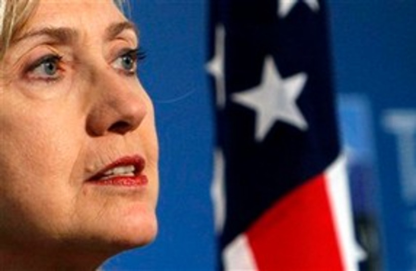 Hillary Clinton face and flag 311 AP (photo credit: AP)