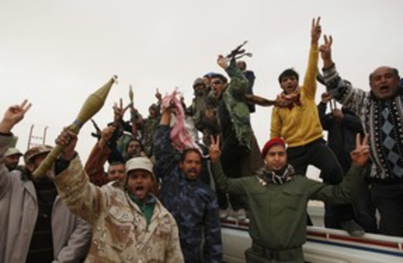 Libya rebels waiting for a fight 311 Reu (photo credit: Asmaa Waguih / Reuters)
