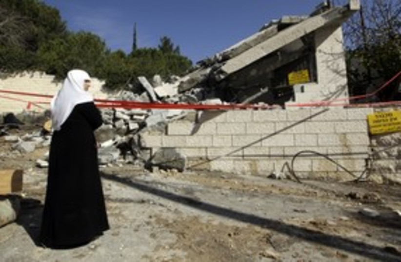 House demoltion in east Jerusalem (R) 311 (photo credit: Reuters)