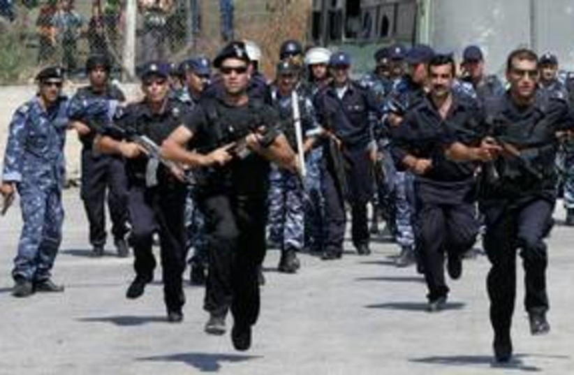 PA police training in Hebron 311 Reu (photo credit: Nayef Hashlamoun / Reuters)