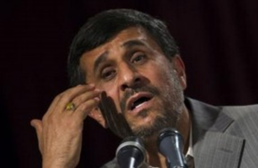 Iranian President Mahmoud Ahmadinejad 311 (R) (photo credit: REUTERS/Morteza Nikoubazl)