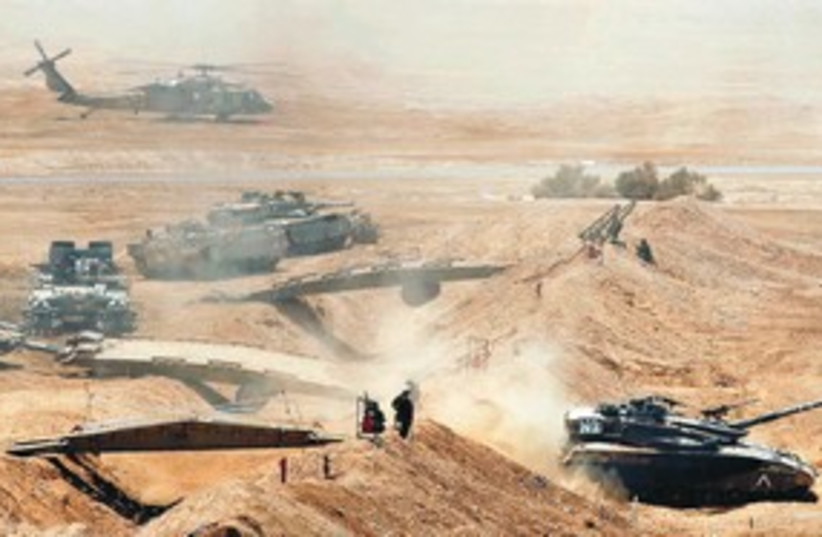 An IDF exercise in the South tanks helicopters  311 (R) (photo credit: Reuters)
