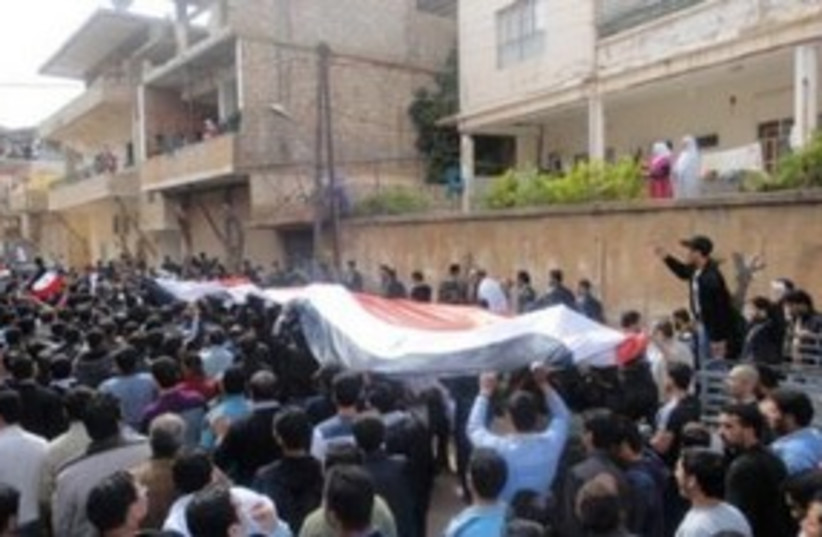 Syria protest flag 311 (photo credit: REUTERS)