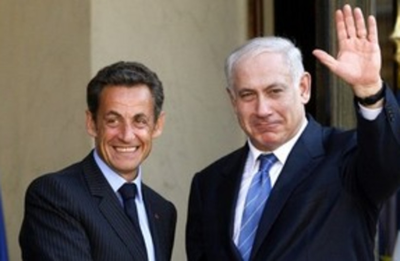 PM Netanyahu with French President Nicolas Sarkozy 311 (R) (photo credit: REUTERS/Benoit Tessier)