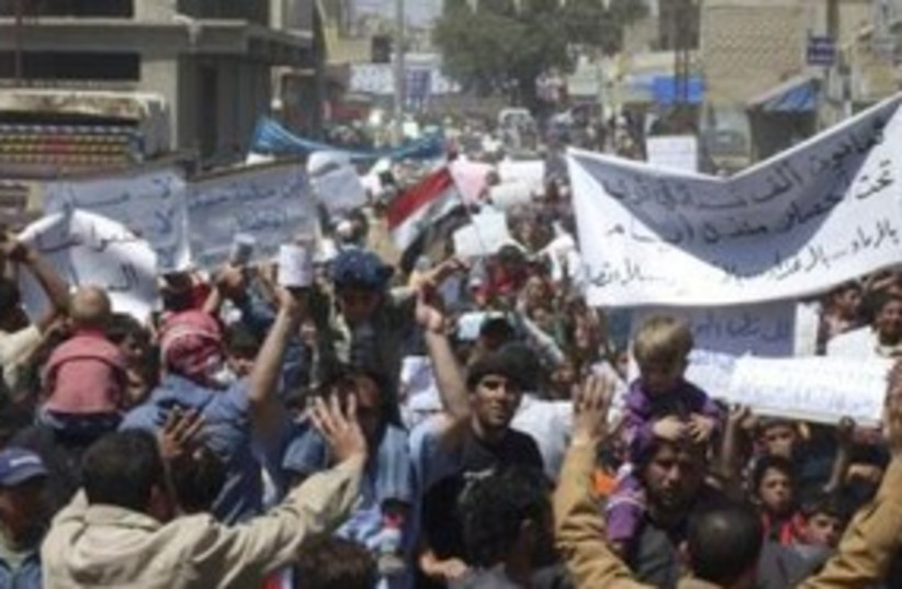 Protestors in Syria 311 (photo credit: Reuters)