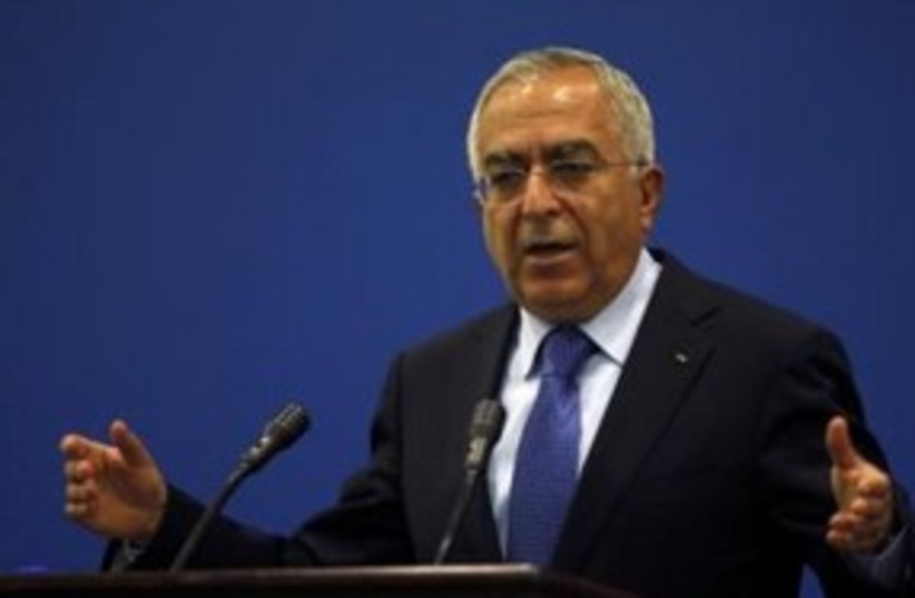 Palestinian Authority Prime Minister Salam Fayyad 311 (R) (photo credit: REUTERS/Mohamad Torokman)