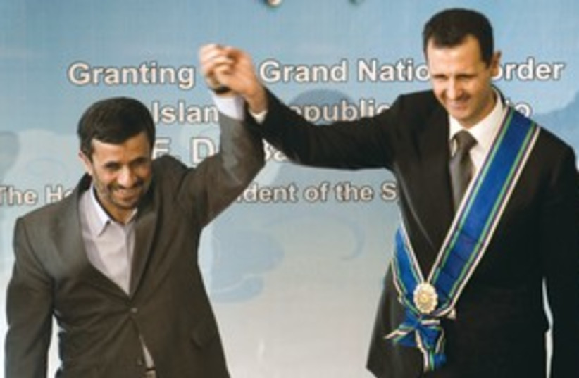 Ahmadinejad Assad 311 (photo credit: REUTERS)