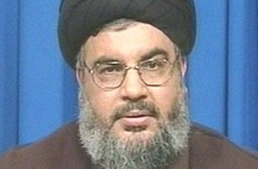 Nasrallah at mike 224.88 (photo credit: Channel 1 [file])