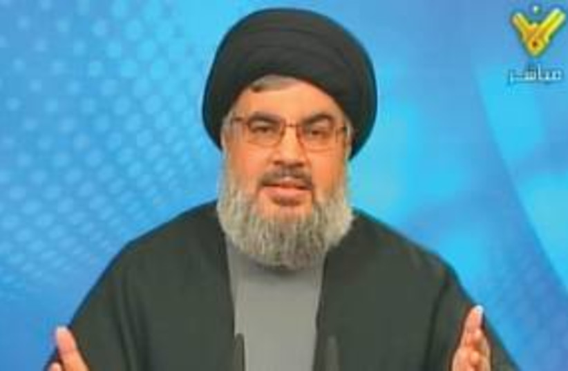 Hezbollah's Hassan Nasrallah 311 (R) (photo credit: Reuters)