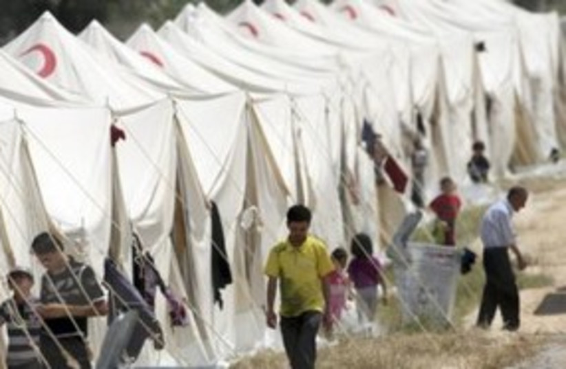 Syrian refugees in Turkish camp 311 (R) (photo credit: REUTERS/Osman Orsal)