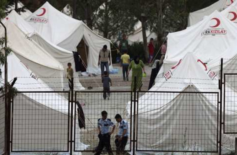 Syrian refugee camp in Turkey 521 (photo credit: REUTERS/Osman Orsal)