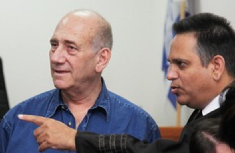 Former prime minister Ehud Olmert with lawyer in court 311 (photo credit: Marc Israel Sellem)