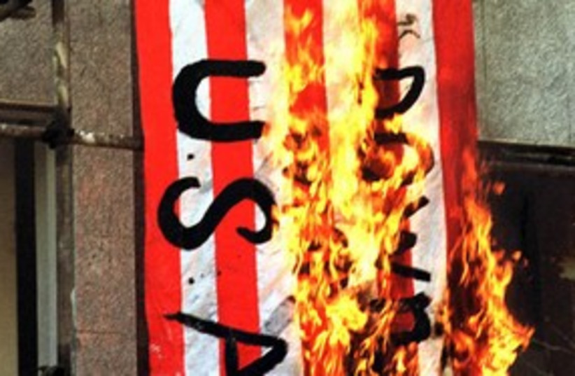 Iranians burn US flag 311 R (photo credit: Reuters)