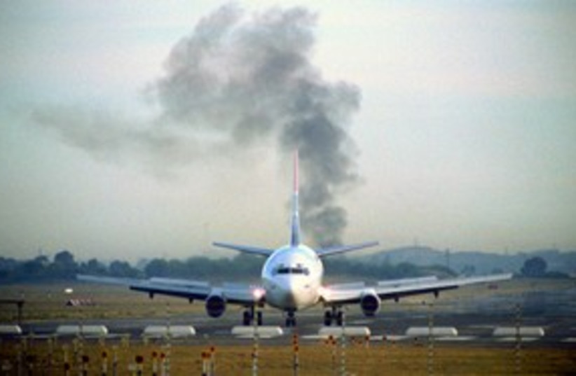 airplane, smoke [illustrative]_311 (photo credit: Thinkstock/Imagebank)