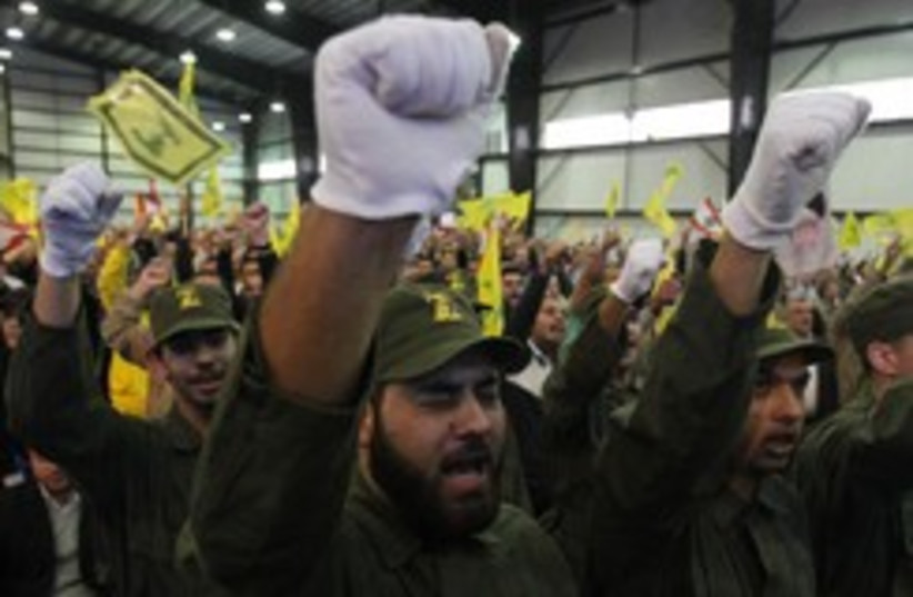 Hezbollah militants chant 260 (photo credit: REUTERS/Sharif Karim)