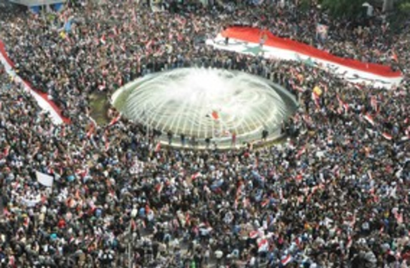 Pro-Assad Syrian protesters 311 (R) (photo credit: REUTERS/Sana/Handout)