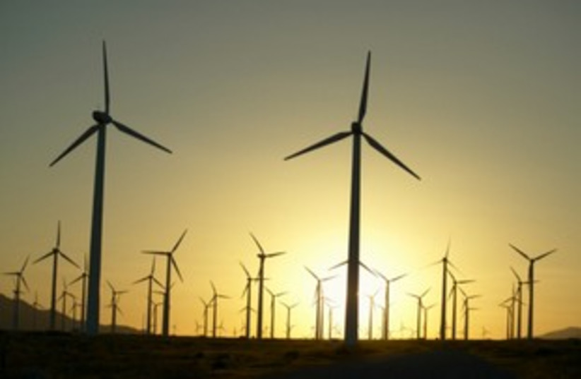 Wind Farm at Sunset (photo credit: Thinkstock/Imagebank)