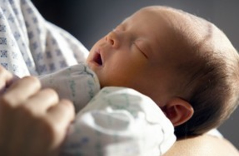 Baby in hospital birth yawn 311 (photo credit: Thinkstock/Imagebank)