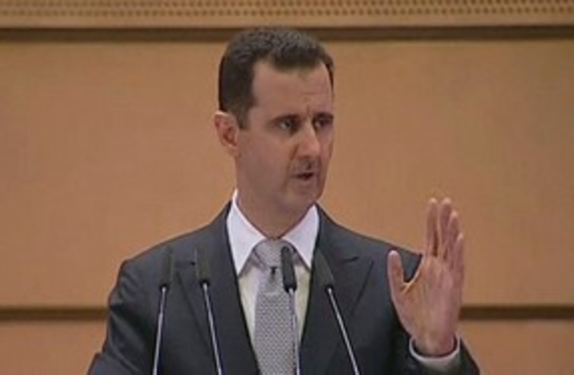 Assad making speech 311 (r) (photo credit: REUTERS/Syrian TV)