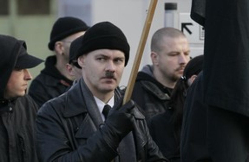 A German neo-Nazi at a rally in Remagen 311 (R) (photo credit: Wolfgang Rattay / Reuters)
