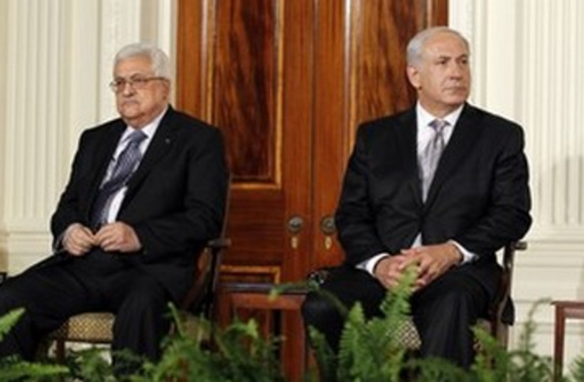 Prime Minister Netanyahu and PA President Abbas 390 (R) (photo credit: Jason Reed / Reuters)