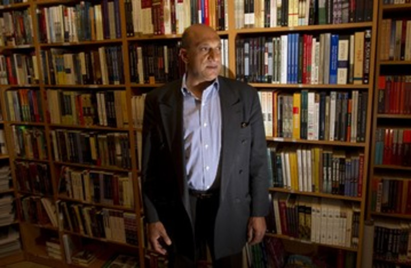 Palestinian book shop owner Munther Fahmi 390 (photo credit: Ronen Zvulun / Reuters)