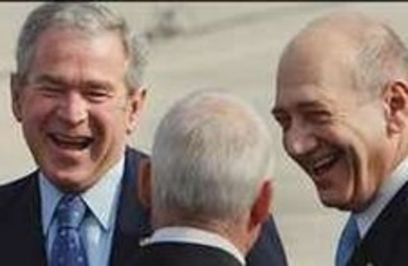 Bush olmert laugh 224.88 (photo credit: AP [file])