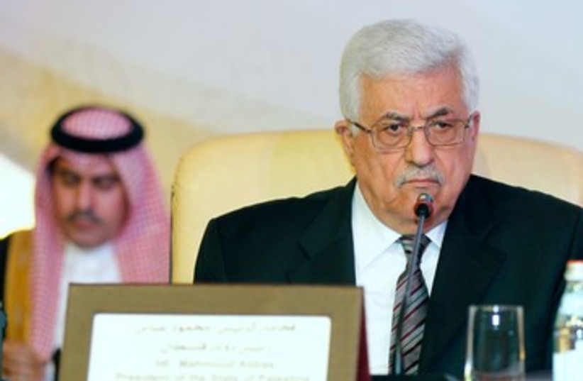 PA President Abbas at Doha conference on J'lem 390 (R) (photo credit: REUTERS/Mohammed Dabbous)