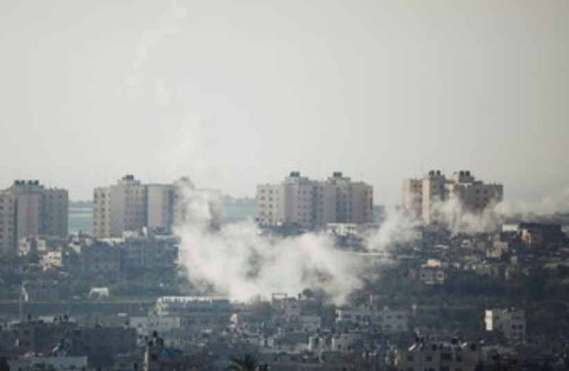 Rockets fired from Gaza smoke 390 (photo credit: REUTERS)