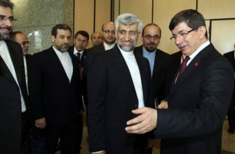Iranian nuclear negotiator Jalili with Davutoglu 370 (photo credit: REUTERS)