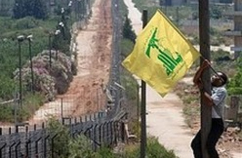 Hizbullah flag border 248.88 (photo credit: AP [file])