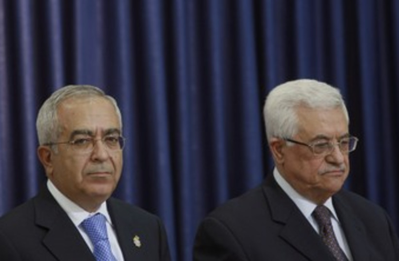 PA President Abbas and PM Fayyad 370 (R) (photo credit: Fadi Arouri / Reuters)