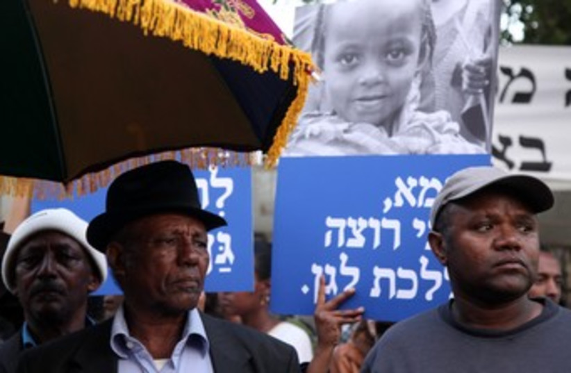 Ethiopian Israelis demonstrate outside PMO in J'lem 370 (photo credit: Marc Israel Sellem)