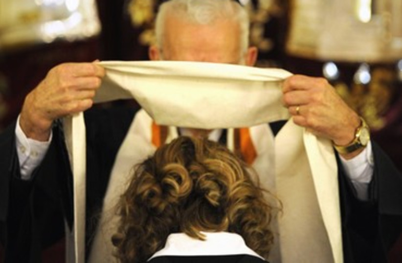 Female rabbi being ordained 370 (photo credit: REUTERS/POOL New)