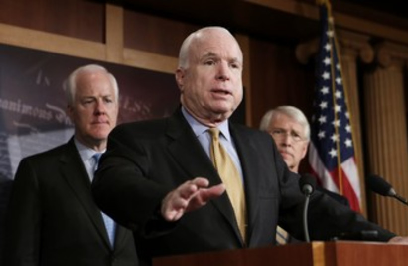 US Senator John McCain 370 (R) (photo credit: Kevin Lamarque / Reuters)