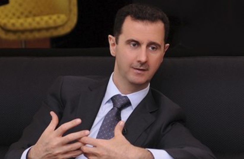 Syrian President Bashar Assad 370 (R) (photo credit: Sana / Reuters)