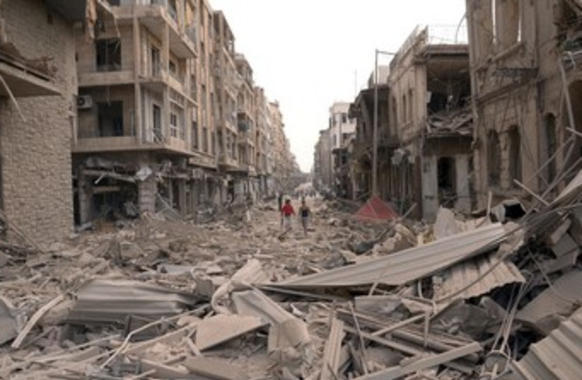Scene of blasts in Syria's Aleppo 370 (R) (photo credit: Sana / Reuters)