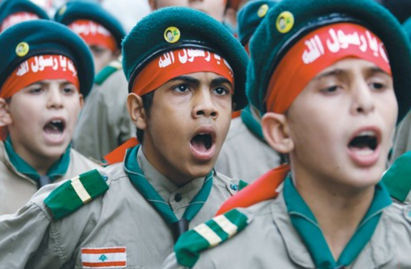 LEBANON’S HEZBOLLAH al-Mahdi boy scouts 521 (photo credit: Reuters)