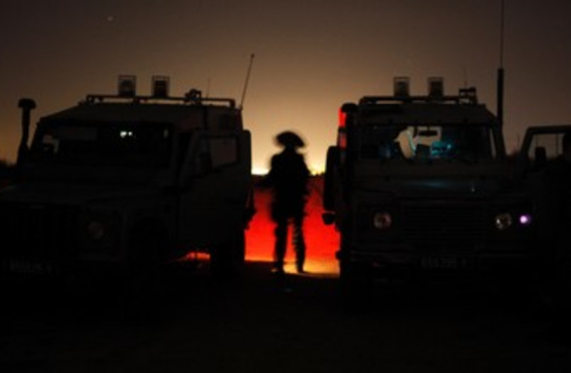 Israeli soldiers on Gaza border 370 (photo credit: Reuters/Amir Cohen)