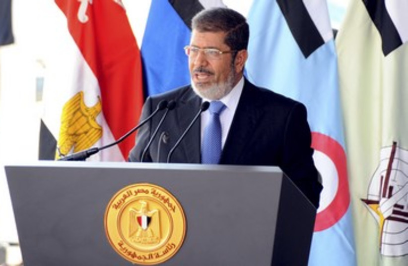 Egyptian President Mohamed Morsi speaking 390 (photo credit: REUTERS)