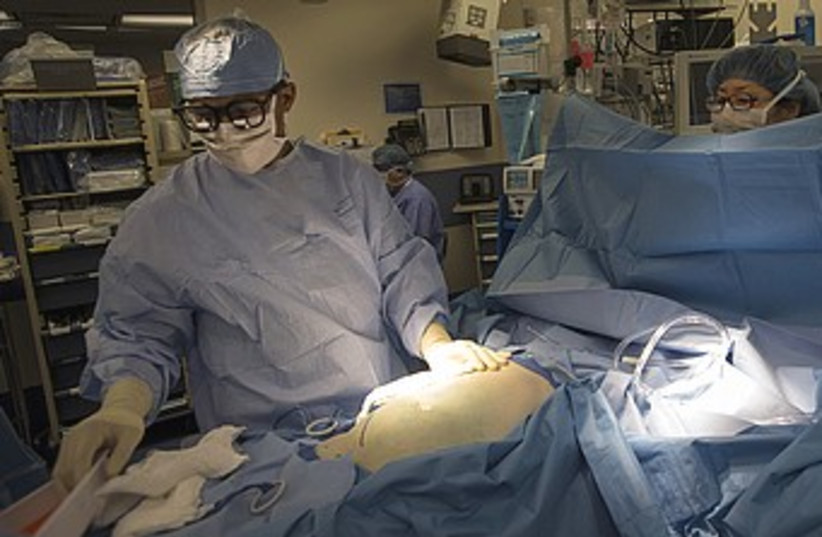 Organ transplant surgery doctor medical dr. 370 (R) (photo credit: Keith Bedford / Reuters)