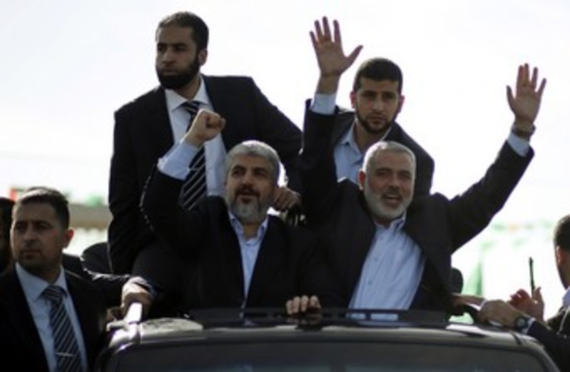 Hamas leader Khaled Mashaal arrives in Gaza 370 (R) (photo credit: Mohammed Salem / Reuters)
