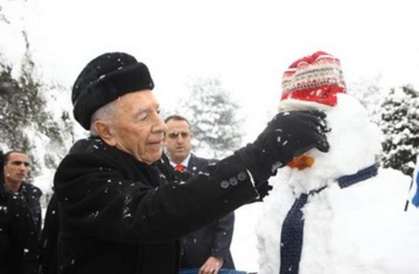 Peres in the snow 390 (photo credit: Gideon Sharon)